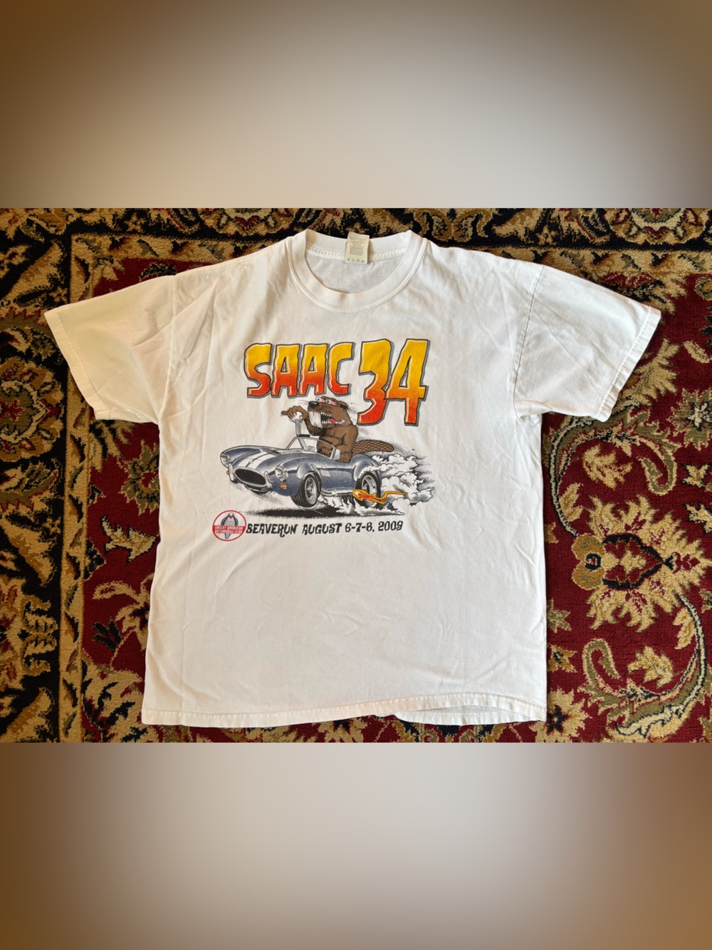 Hanes White Men’s SAAC 34 Graphic Tee with Yellow-Orange Lettering
